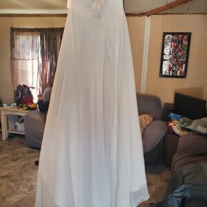 Wedding dress with headpiece, veil, and strapless corset bra